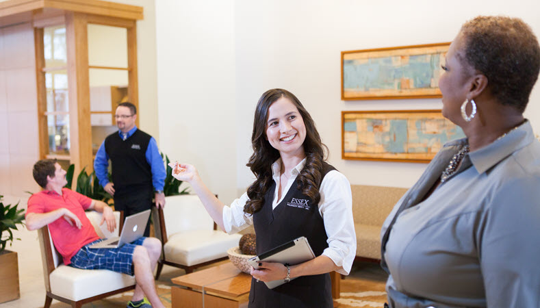 leasing office with customers and leasing agents