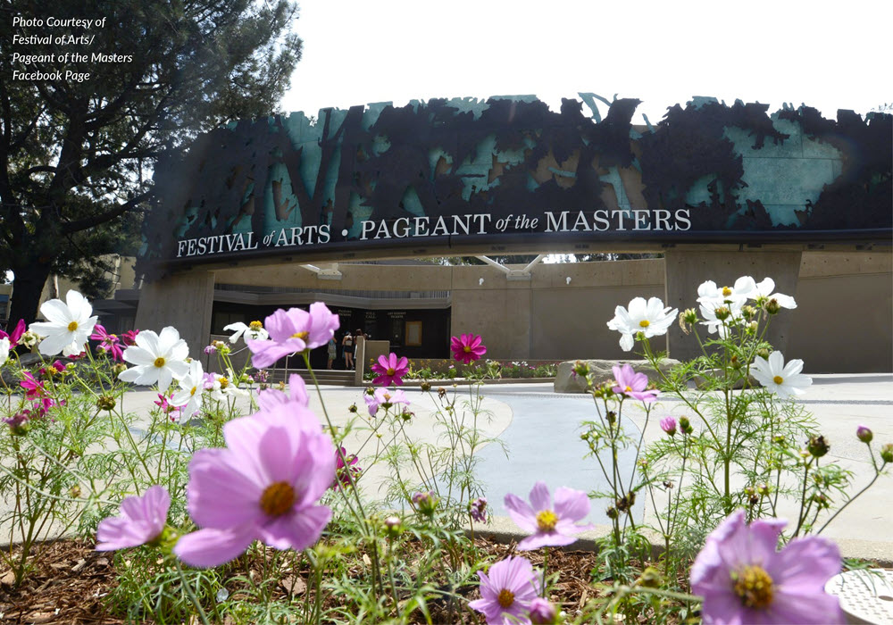 Exterior building of Pageant of the Masters with flower landscaping.