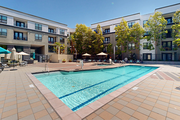 Swimming pool with lounge furniture.