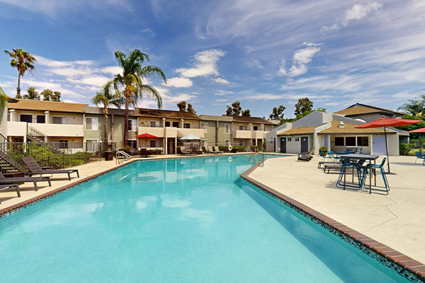 Swimming pool with lounge furniture